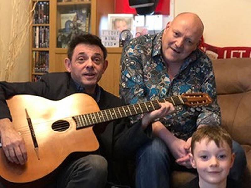 World Cancer Day: Prog Rock Legend signs guitar for charity fundraiser