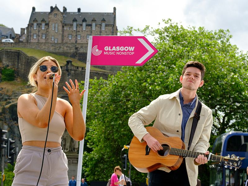 Rising female artists pop up for surprise busking set in on Castle Street Edinburgh