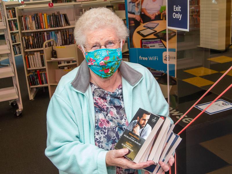 Kilbarchan resident Ann Clark is first through the door as libraries reopen!