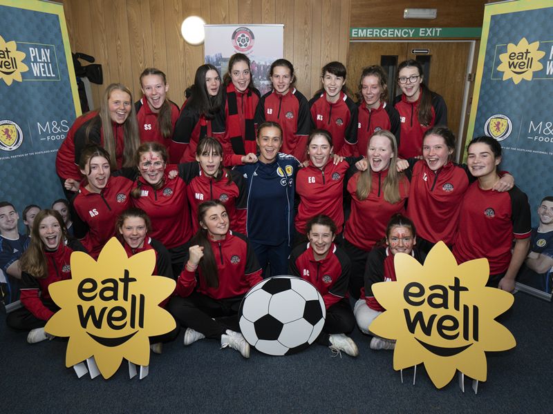 Scotland defender, Leah Eddie, and M&S Food surprise Giffnock Soccer Centre Under 16 Girls Team