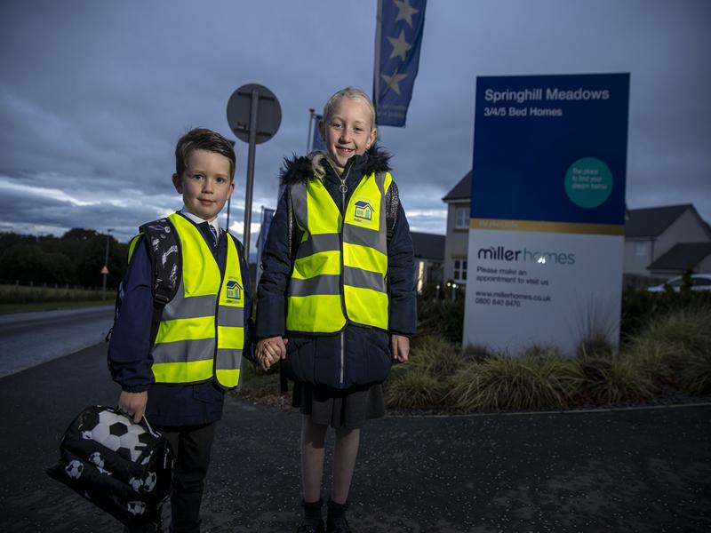 House builder donates high vis vests to school children across the region